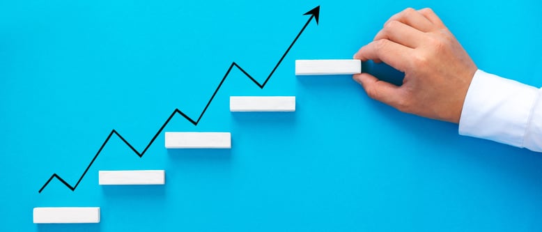 businessman-hand-arranging-wood-block-stacking-as-2021-08-30-04-31-23-utc-1